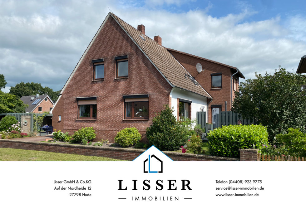 Schönes Zweifamilienhaus mit gepflegtem Garten Schönes Zweifamilienhaus mit gepflegtem Garten